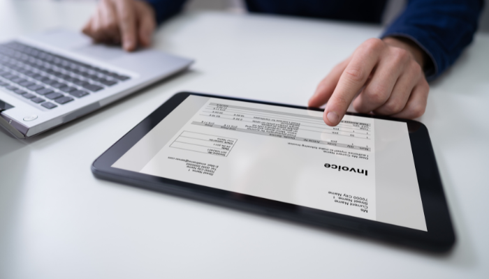 Invoice displayed on a tablet screen for fast digital billing after work is completed