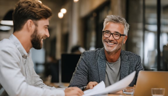Business owner meeting with a financial partner to discuss working capital solutions, highlighting personalized support for small businesses.