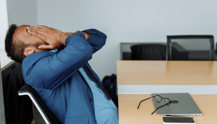 Business owner showing stress after a funding decision gone wrong.