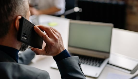 Business team in discussion during a meeting about next steps and decisions